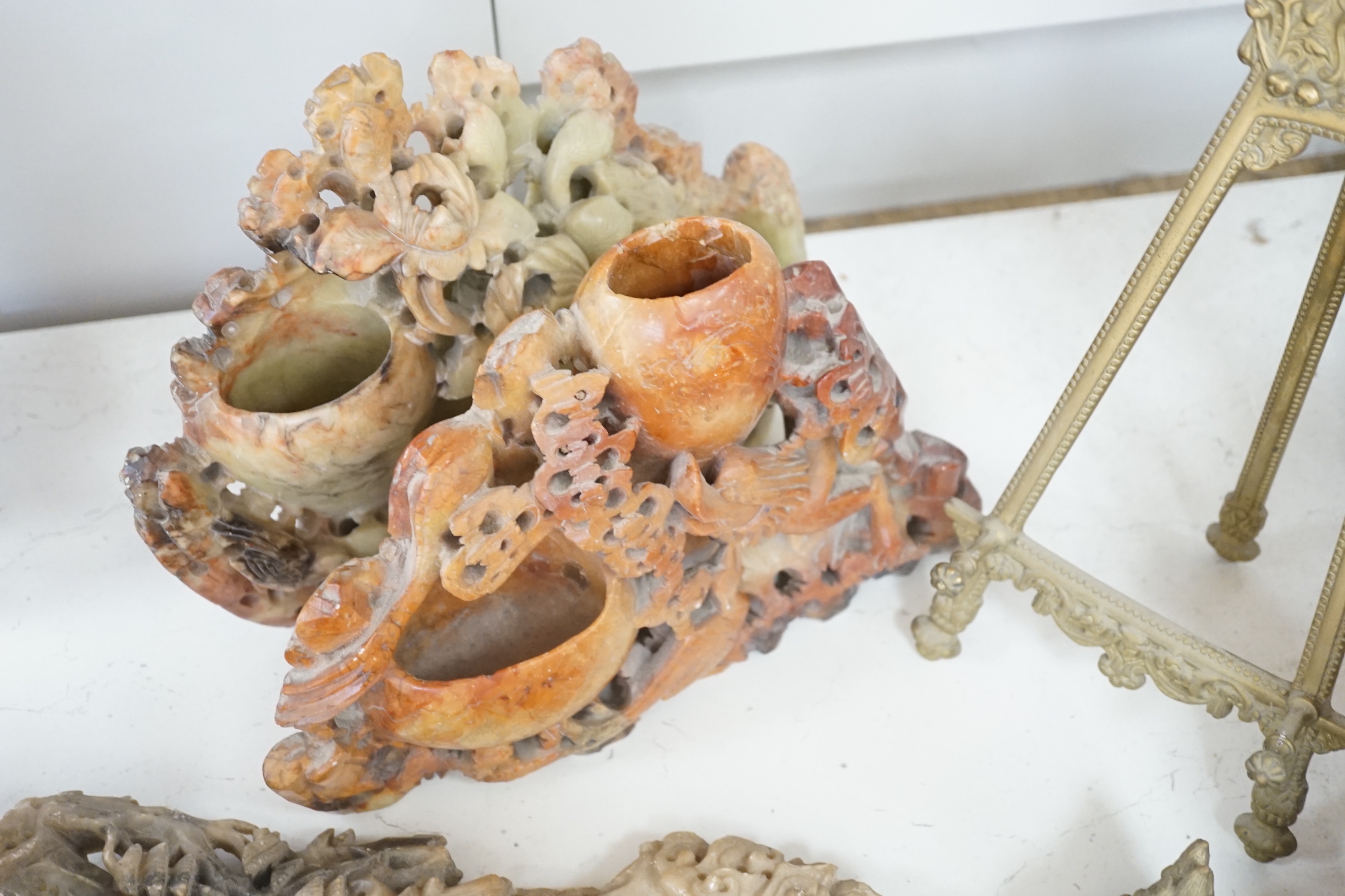 Three Chinese soapstone carvings and a bronze model of a Lónggui, 16cm wide